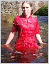  Purity goes for a paddle in a nice red dress featuring Purity, the artist 