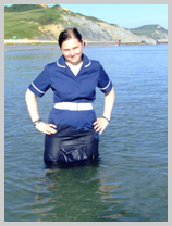  Nurse Wendy-Household sea-bathing in full uniform and wellies featuring Nurse Wendy-Household, Registered Gunge Nurse 