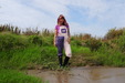 view details of set gm-4m065, Isabeau wears pink and purple dungarees into a spectacular riverbank mudbath