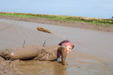 view details of set gm-4m065, Isabeau wears pink and purple dungarees into a spectacular riverbank mudbath