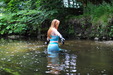 view details of set gm-4w043, Lily Kink takes a clothed dip in the estate river